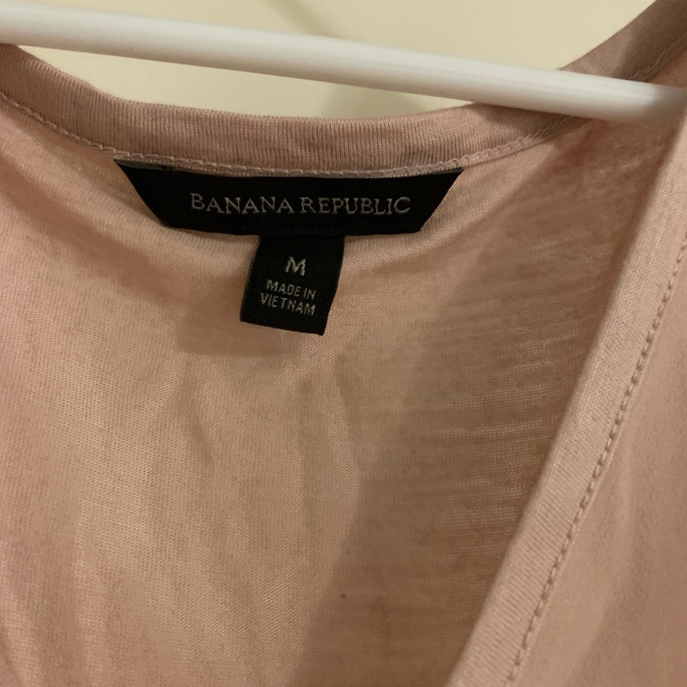 Pink blush sleeveless high low blouse